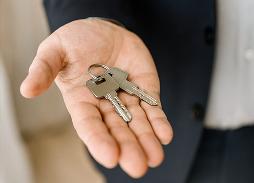 Business locksmith installing secure access system