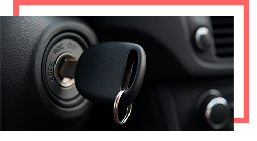 Car transponder key inserted into ignition system